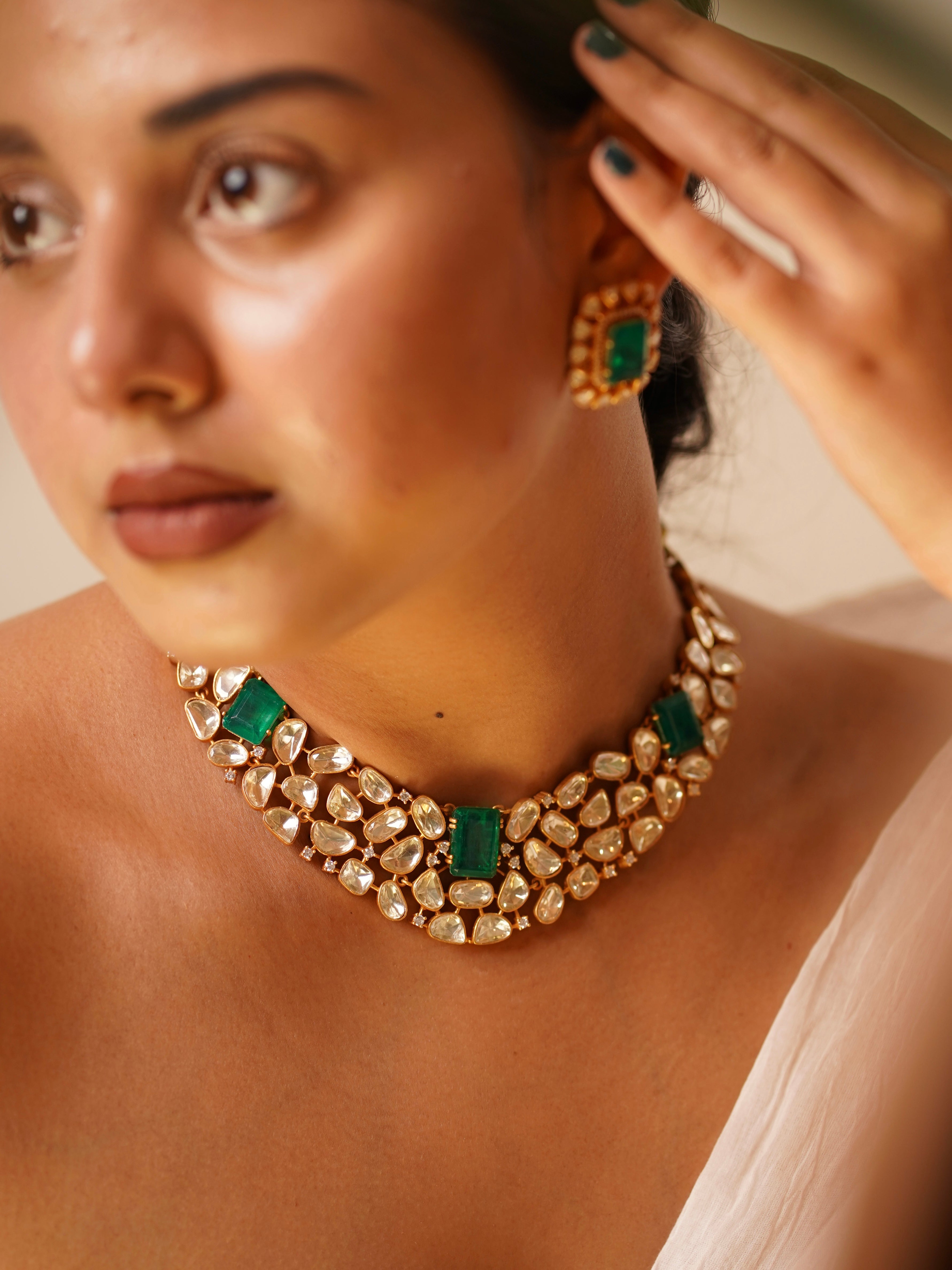 Side view of choker necklace set highlighting pearl drops and screw-back earrings